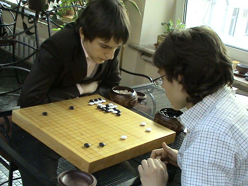 Children play Go game in Moscow